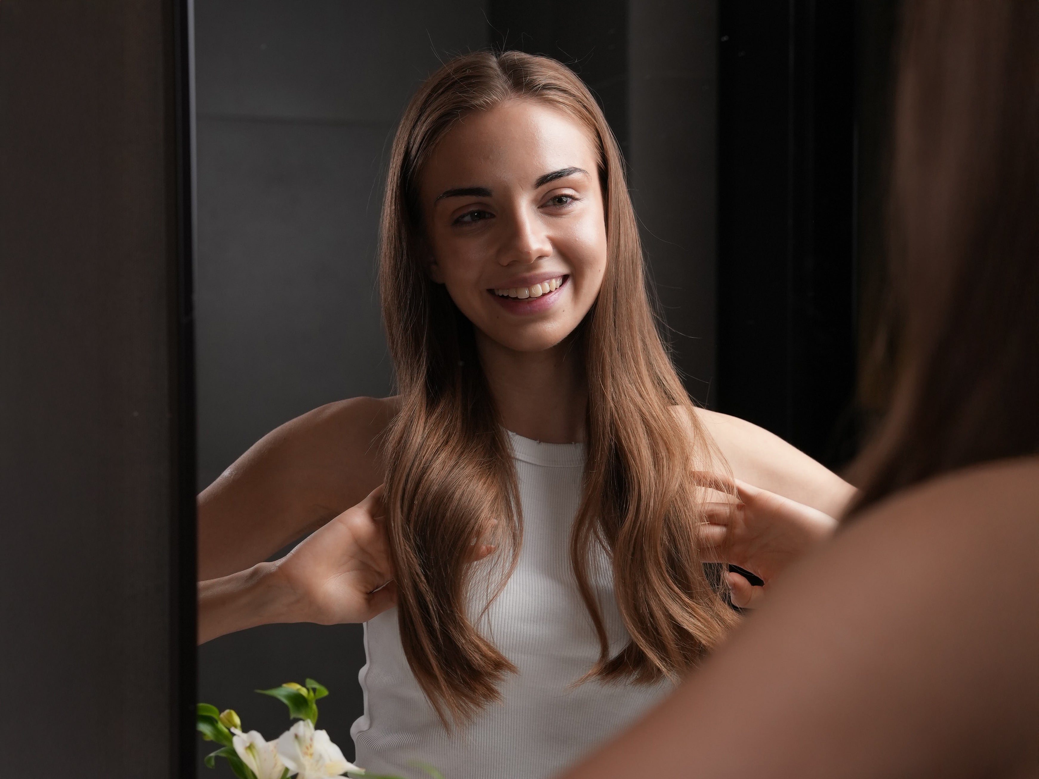 happy women with healthy and shiny hair